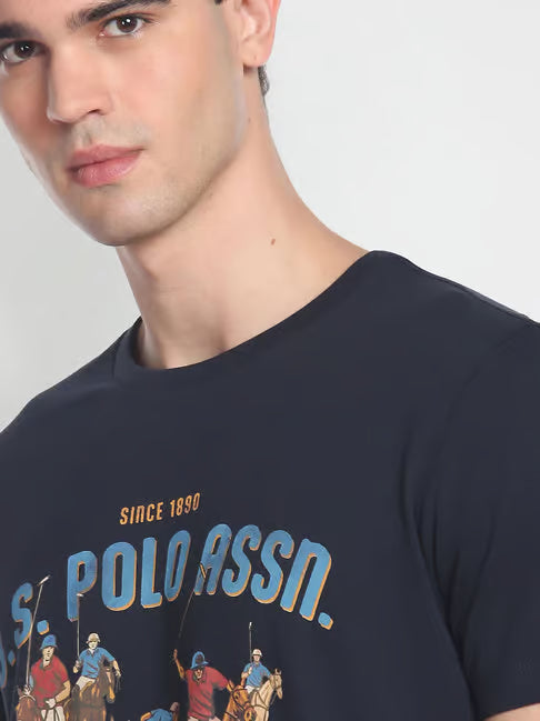 U.S. Polo Assn. Navy Blue Cotton Slim Fit Printed T-Shirt (यू.एस. पोलो नेव्ही ब्लू कॉटन स्लिम फिट प्रिंटेड टी-शर्ट)