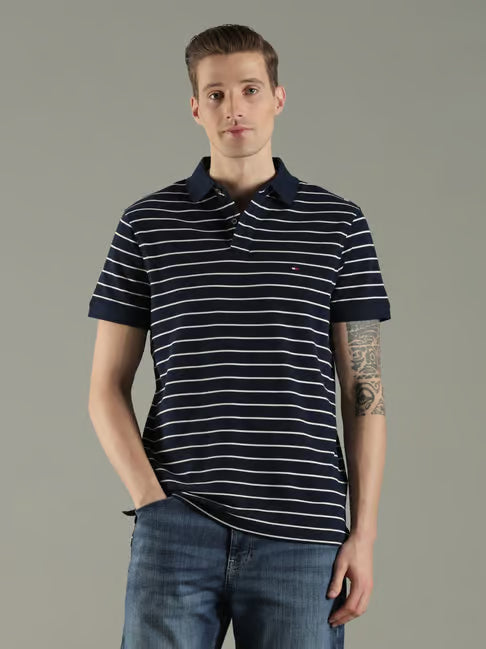Tommy Hilfiger Navy Striped Regular Fit Polo T-Shirt (टॉमी हिलफिगर नेव्ही स्ट्राइप्ड रेग्युलर फिट पोलो टी-शर्ट)